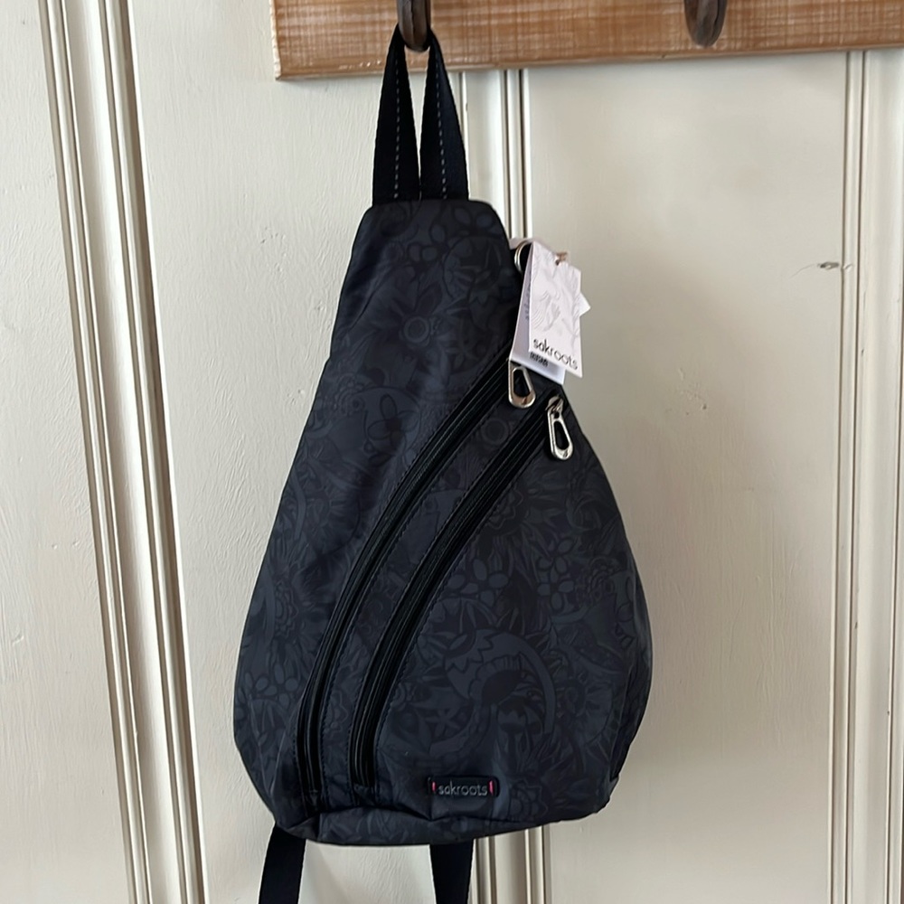 Sakroots Black Sling Backpack for Women— color: Black Tonal Spirit Desert